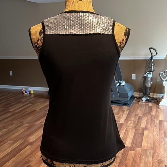 Two tank tops one black one lime green with silver sequins on the tops - Picture 3 of 6